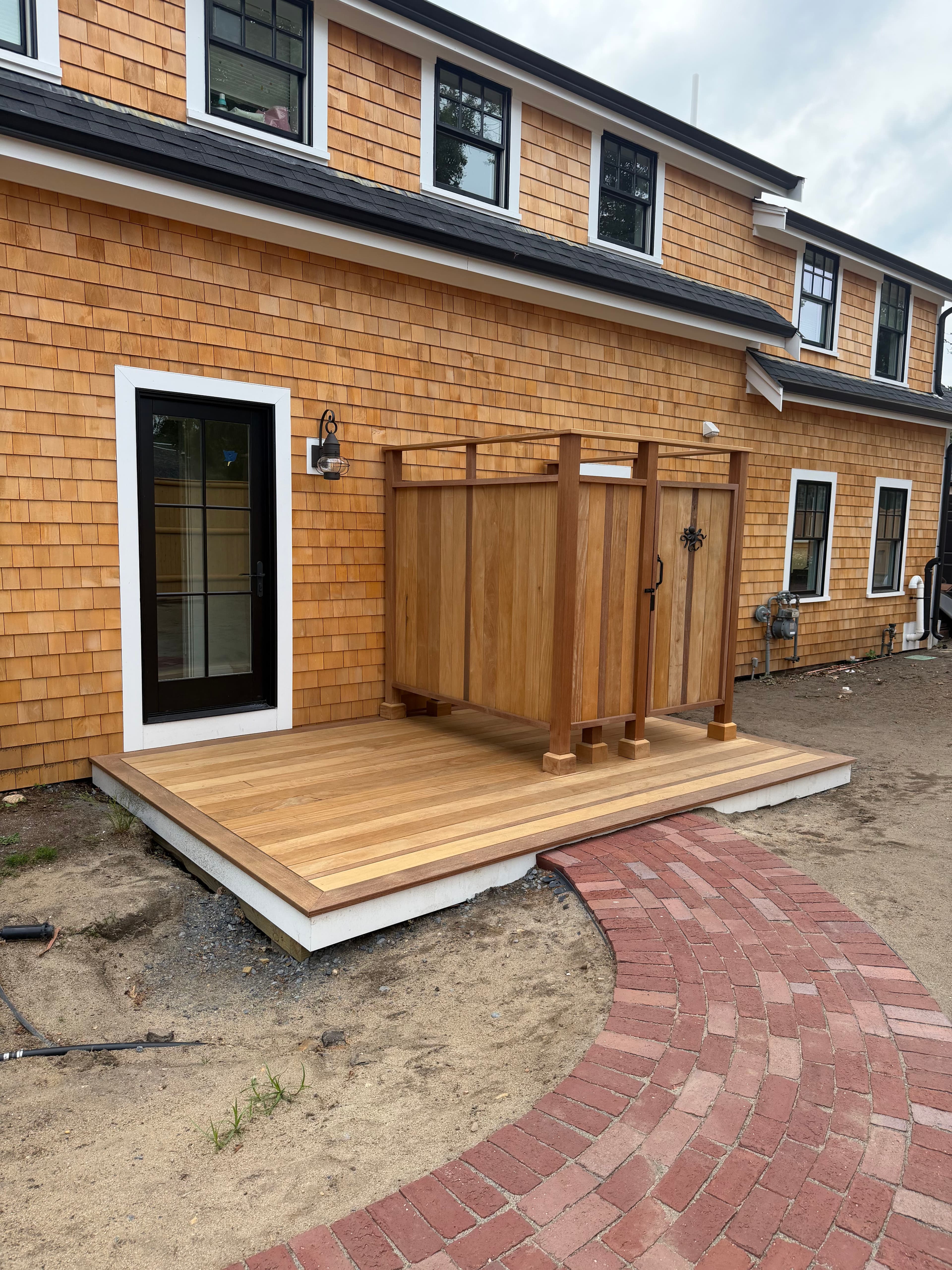 Project Garapa Deck and Custom Outdoor Shower Built for Beach Life image